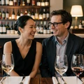 Happy couple laughing together at an upscale wine bar